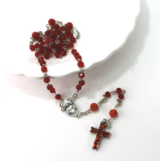 Ginette Reno - Chapelet avec billes rouge, croix ornée de pierres rouges 300-1