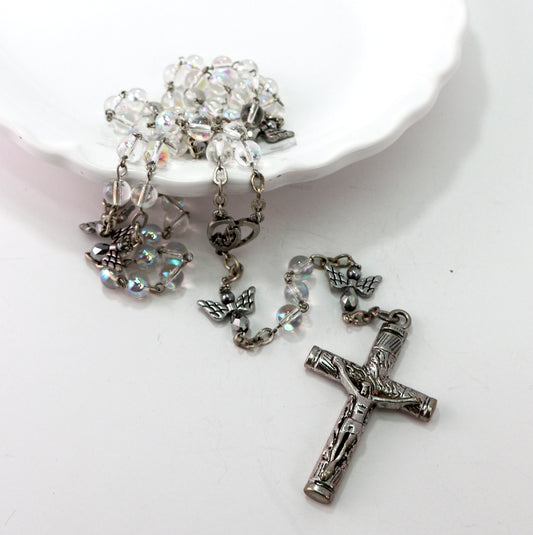 Ginette Reno - Chapelet avec billes translucides et anges argentées, croix du Christ 314-1